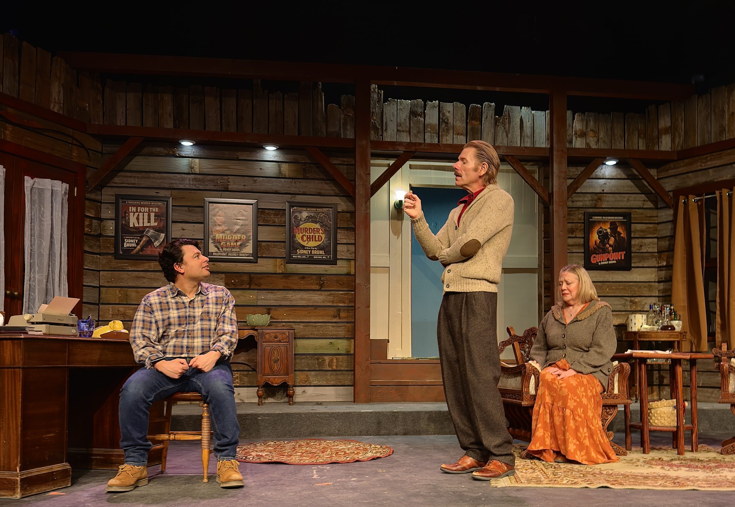 (L-R) Victor Mendez as Clifford Anderson, Stephen Peirick as Sidney Bruhl, and :Anne Vega as Myra Bruhl, in "Deathtrap" at Stray Dog Theatre. Courtesy of Stray Dog Theatre.